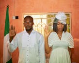 Formal Ceremony with Couple and National Flag