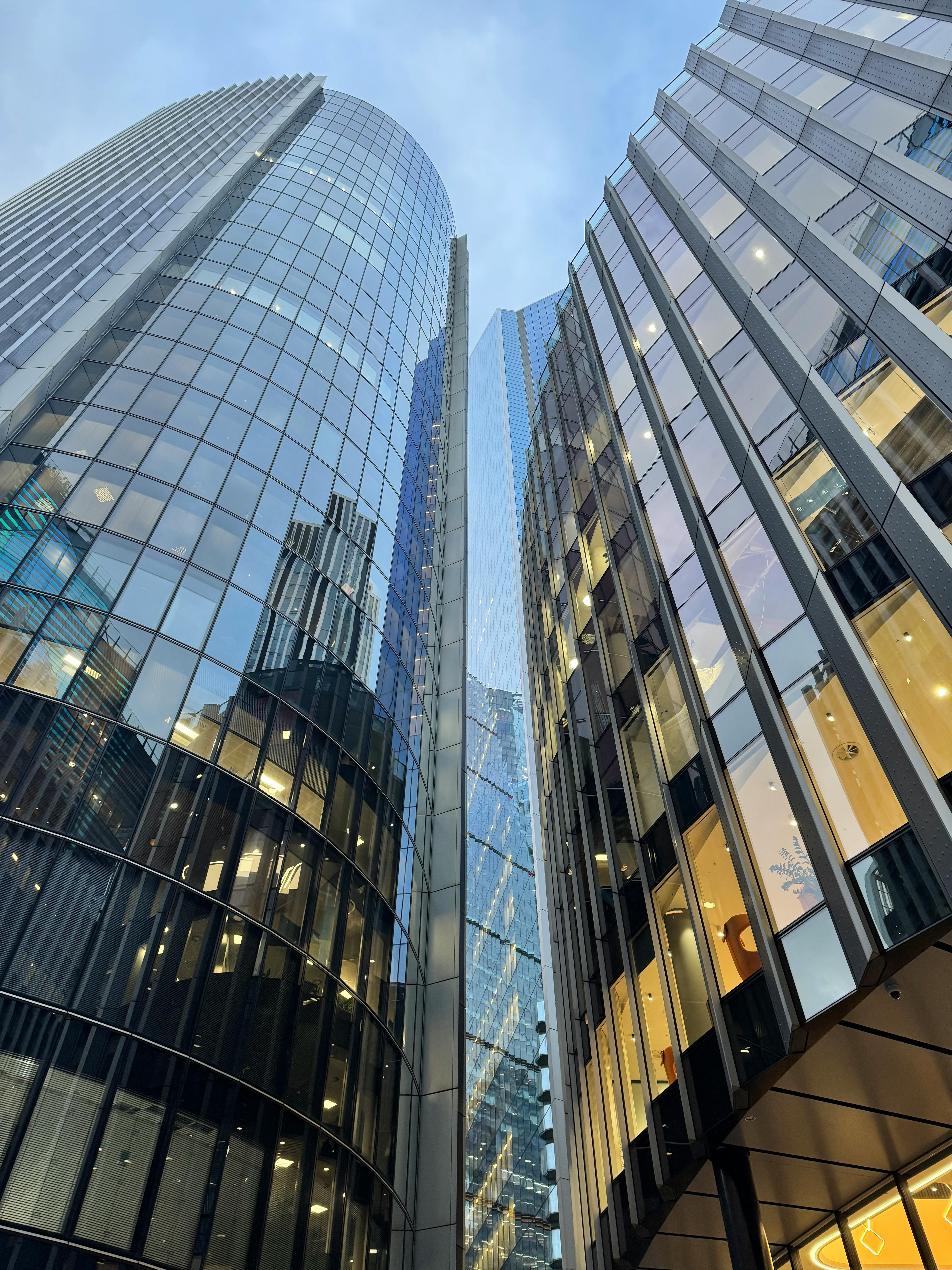 Impressive glass skyscrapers in London, showcasing modern architectural design.