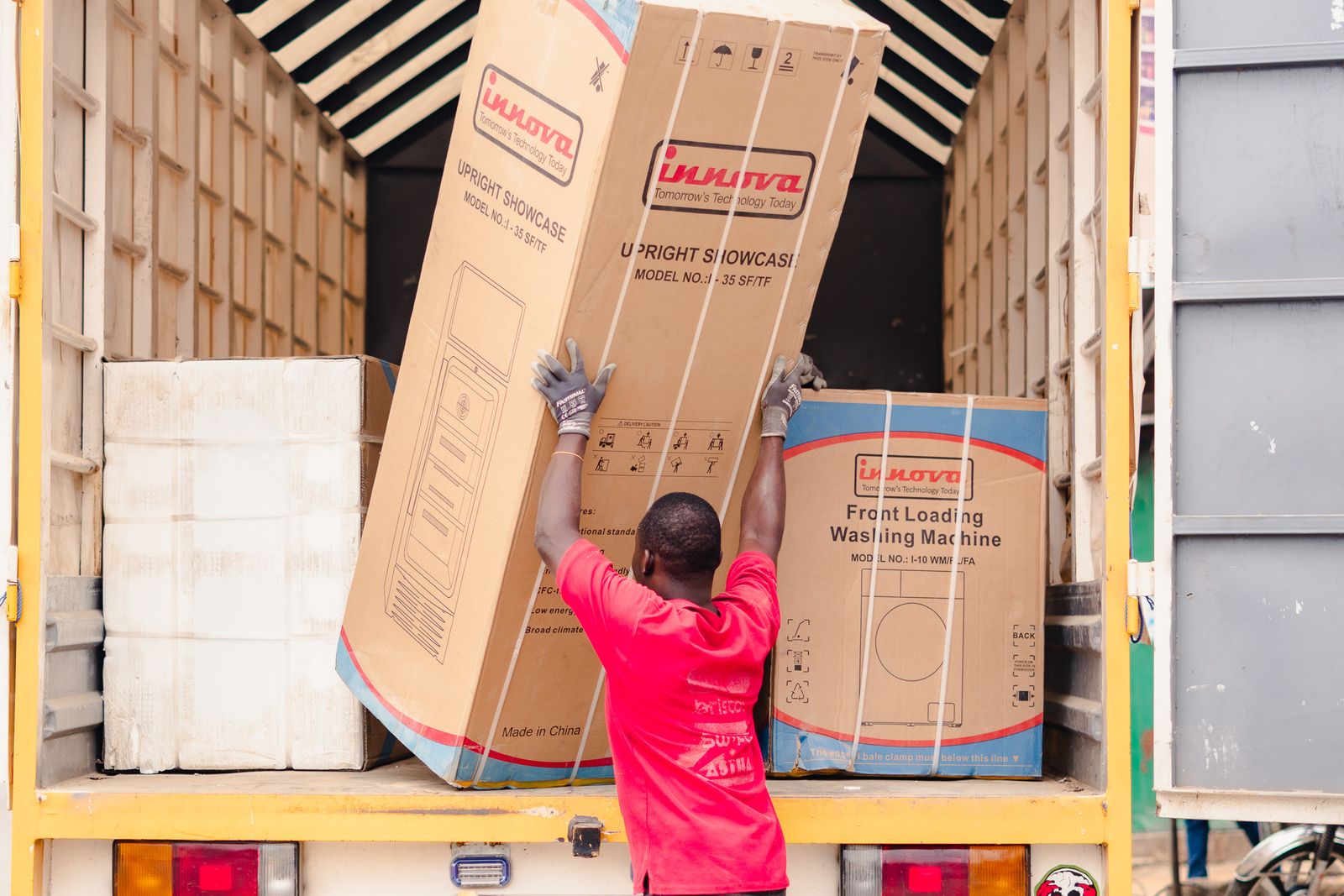 Kruze two-man crew delivering a washing machine in Leeds, West Yorkshire