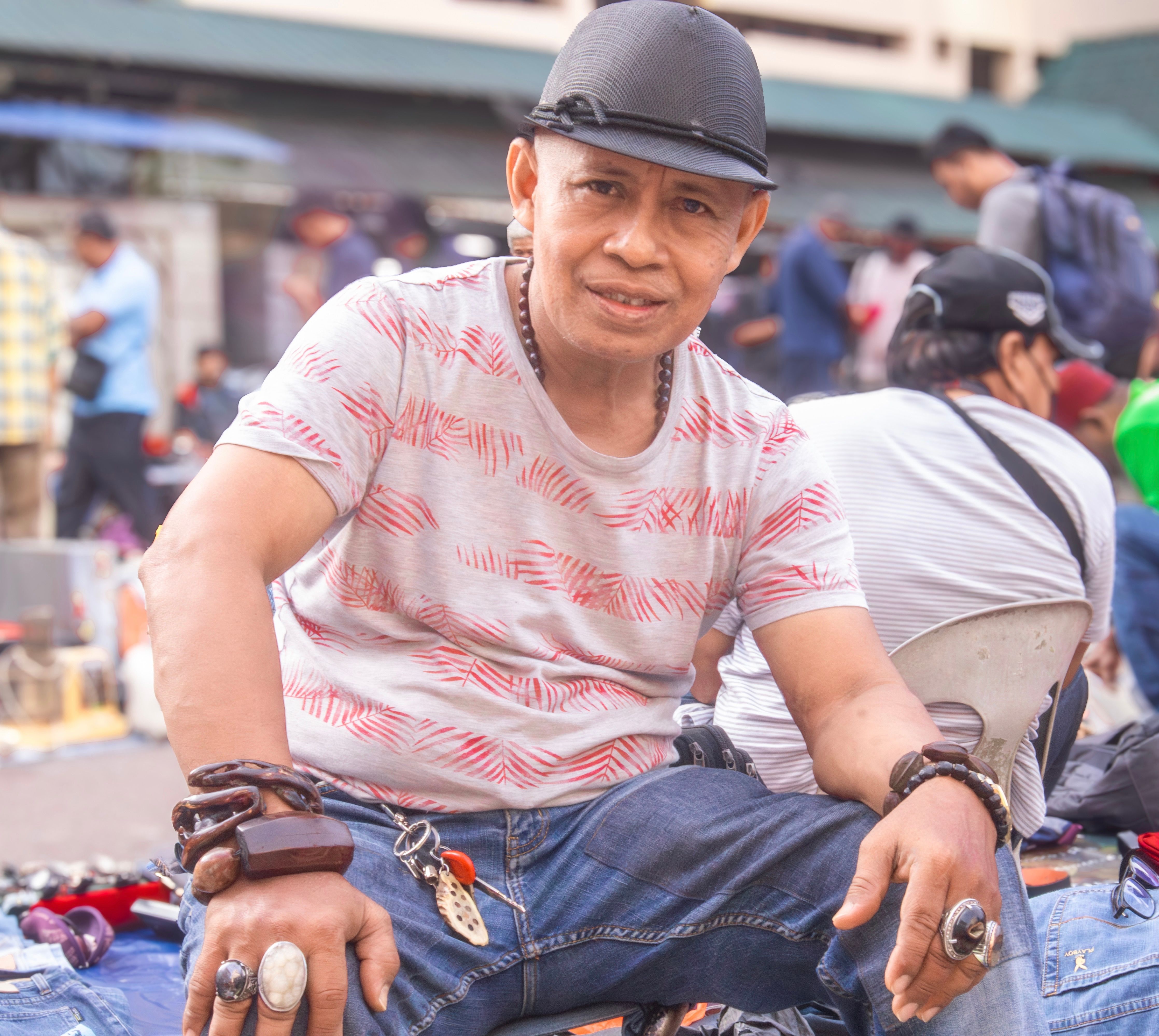 Portrait of a Man at a Street Market