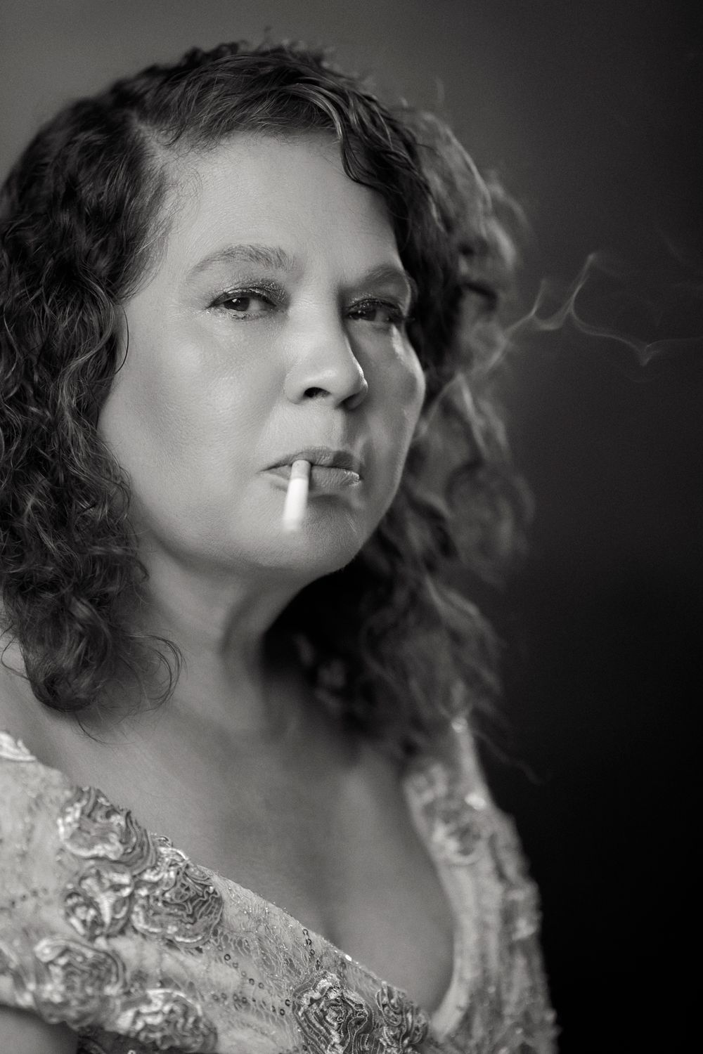 Dramatic Portrait of a Smoking Woman in Black and White · Free Stock Photo