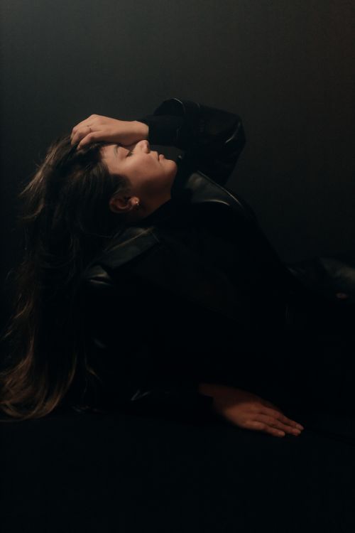 Free Artistic portrait of a woman in dark tones, emphasizing mood and emotion. Stock Photo