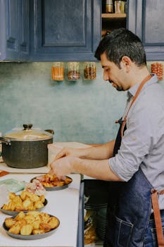 Man preparing a meal with fresh ingredients in a cozy kitchen setting.