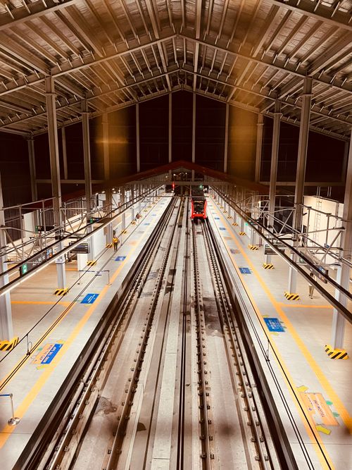 Free A high angle view of an empty train depot in Parañaque, Metro Manila with railway tracks. Stock Photo