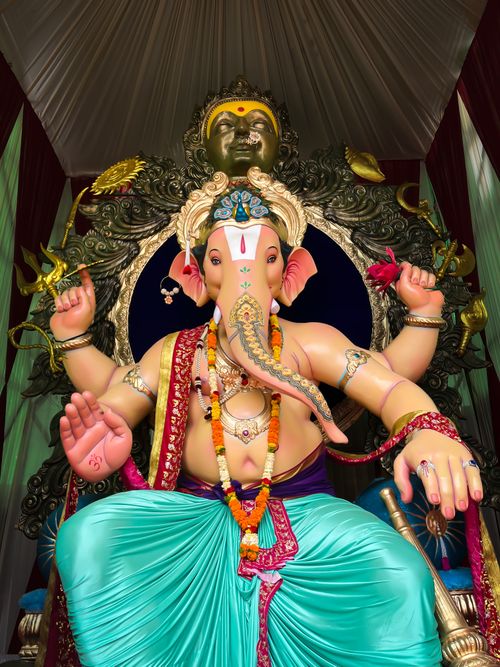 Free Colorful depiction of Lord Ganesh at the renowned Satara Ganesh Festival, India. Stock Photo