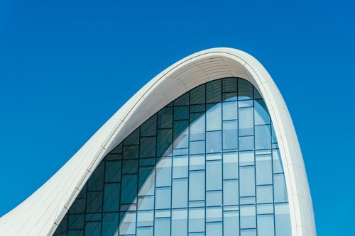 Free A stunning view of the Heydar Aliyev Center's modern architecture in Baku, Azerbaijan. Stock Photo