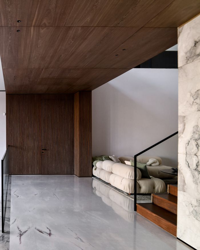 Minimalist interior in marble and wood