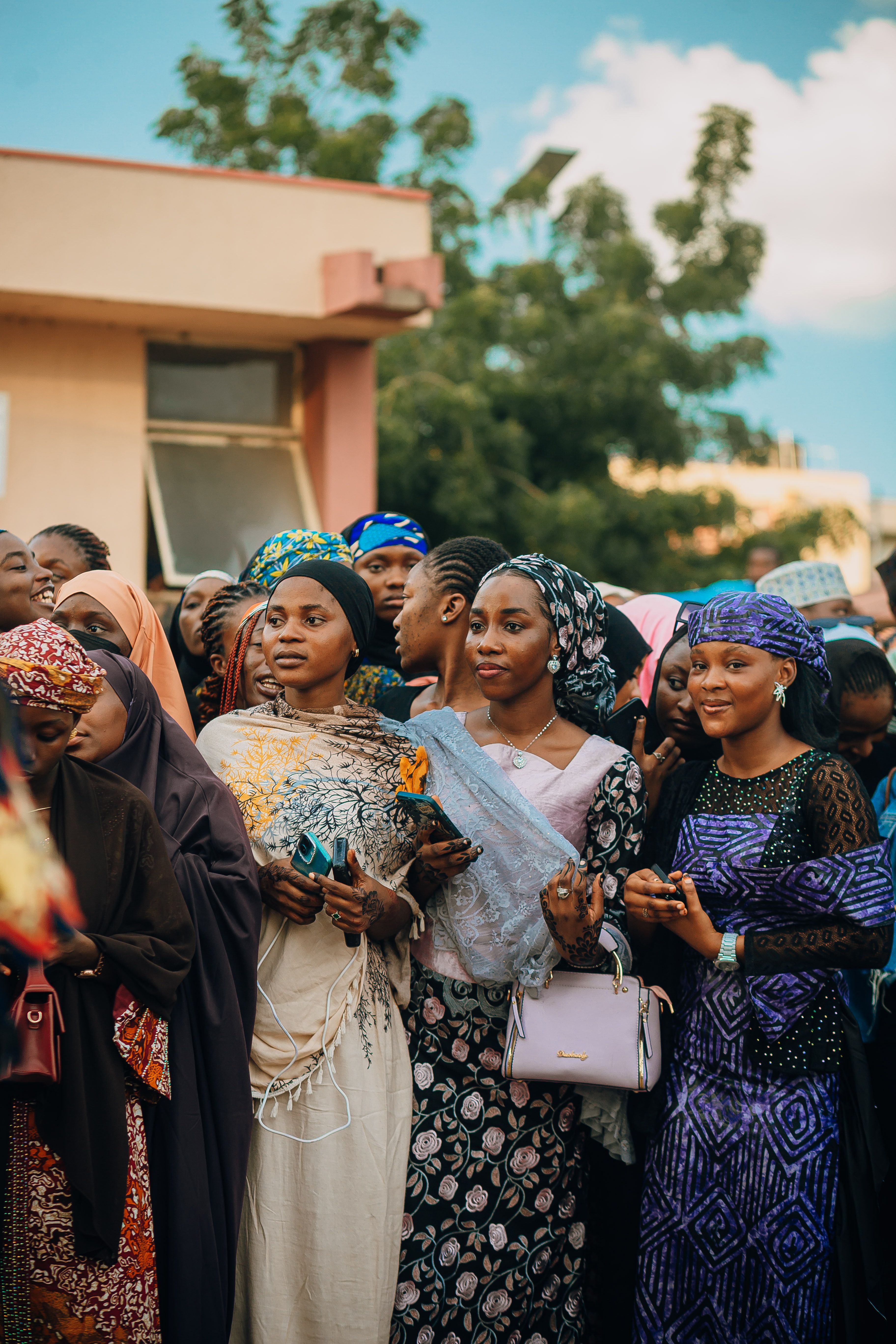 Women in Colorful Traditional Attire at Outdoor Event · Free Stock Photo
