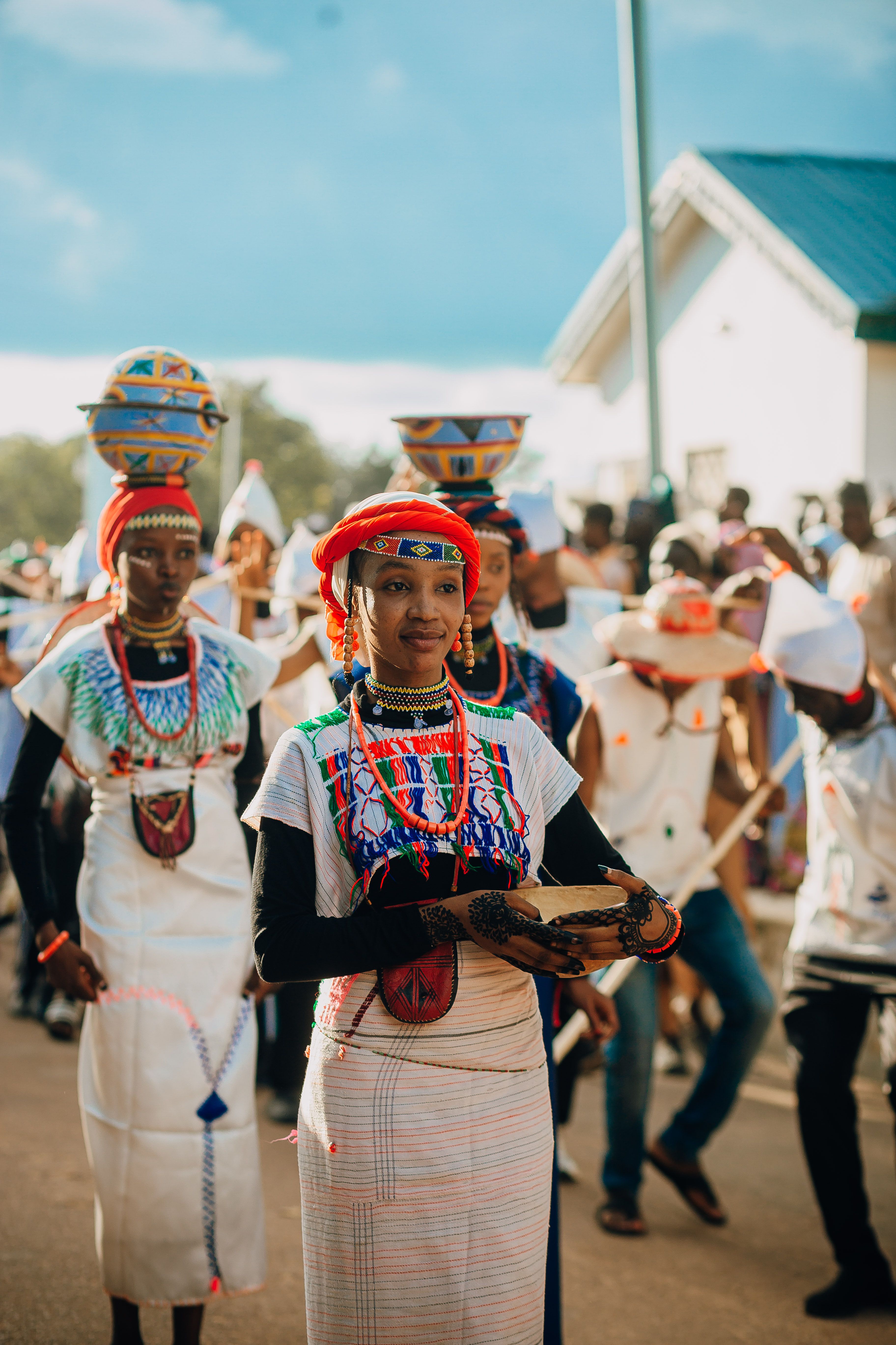Traditional African Cultural Parade with Vibrant Attire · Free Stock Photo
