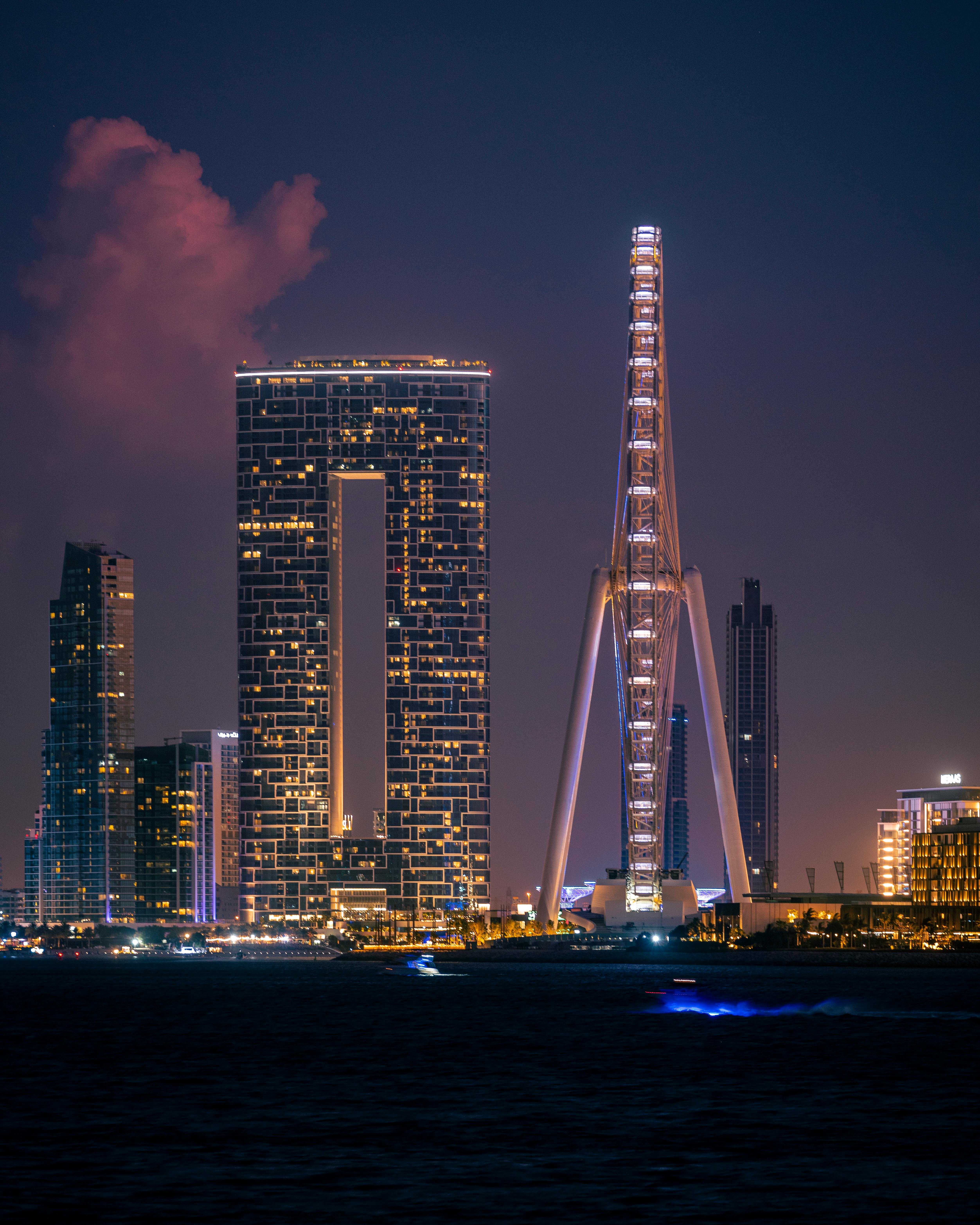 A captivating nighttime view of Dubai's skyline featuring Ain Dubai and modern architecture.