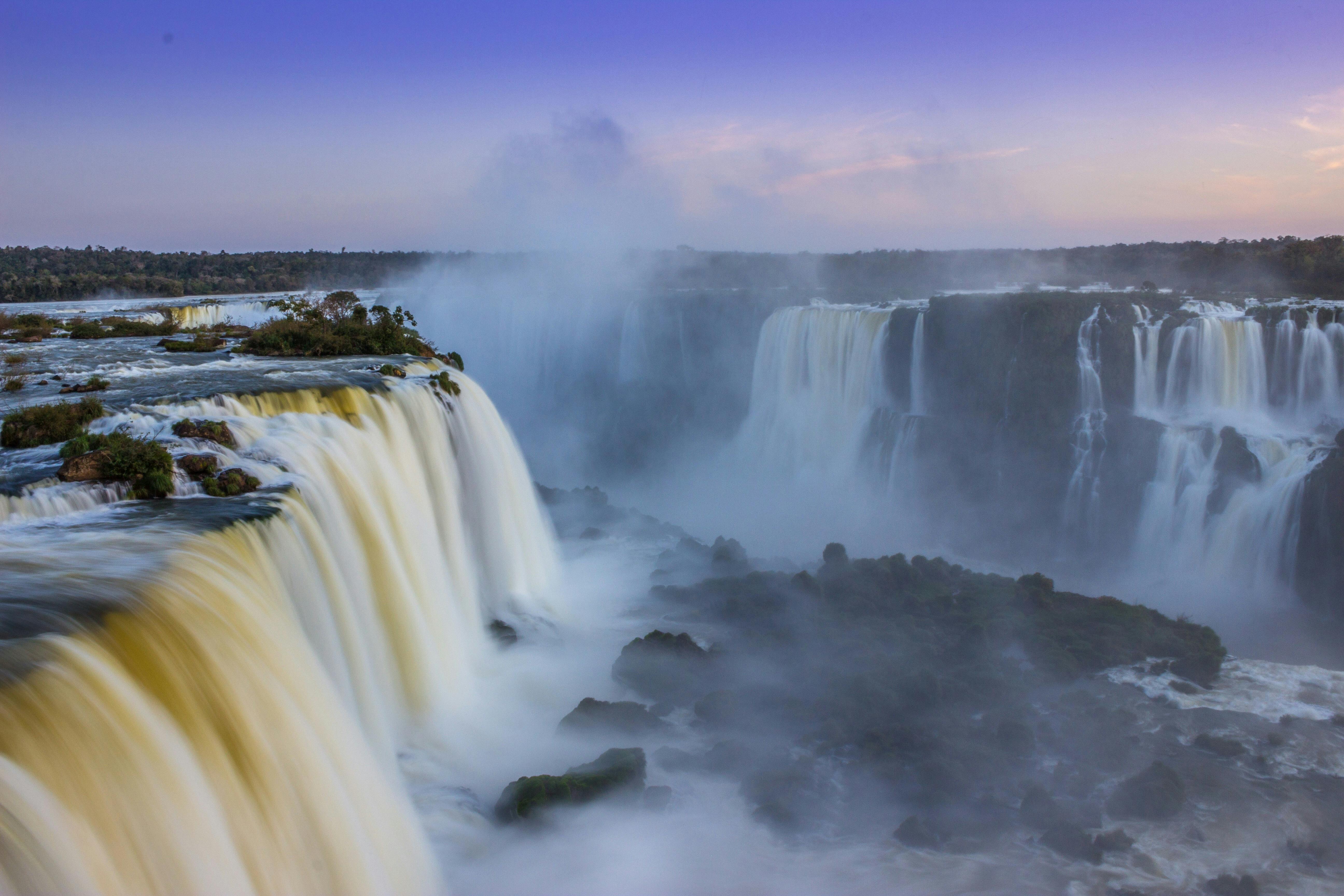 Breathtaking view of Iguassu Falls during sunrise in Foz do Iguaçu, Brazil.