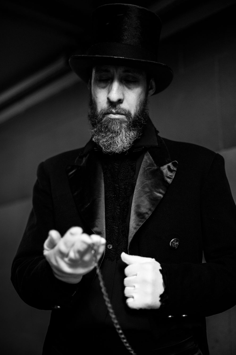 Elegant Man in Vintage Attire with Top Hat · Free Stock Photo