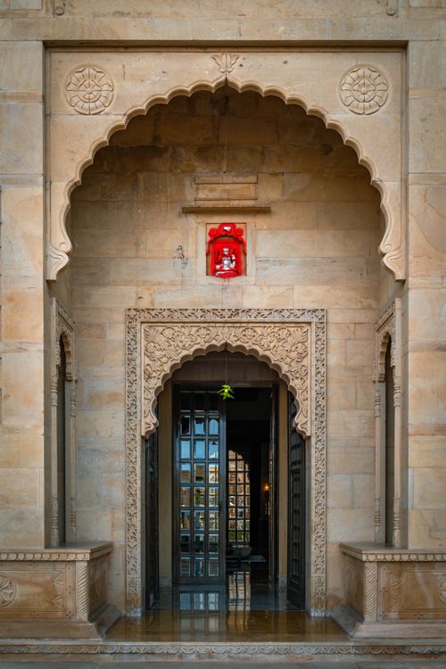 Free Stunning entrance of Suryagarh Palace in Jaisalmer, Rajasthan showcasing intricate architecture. Stock Photo