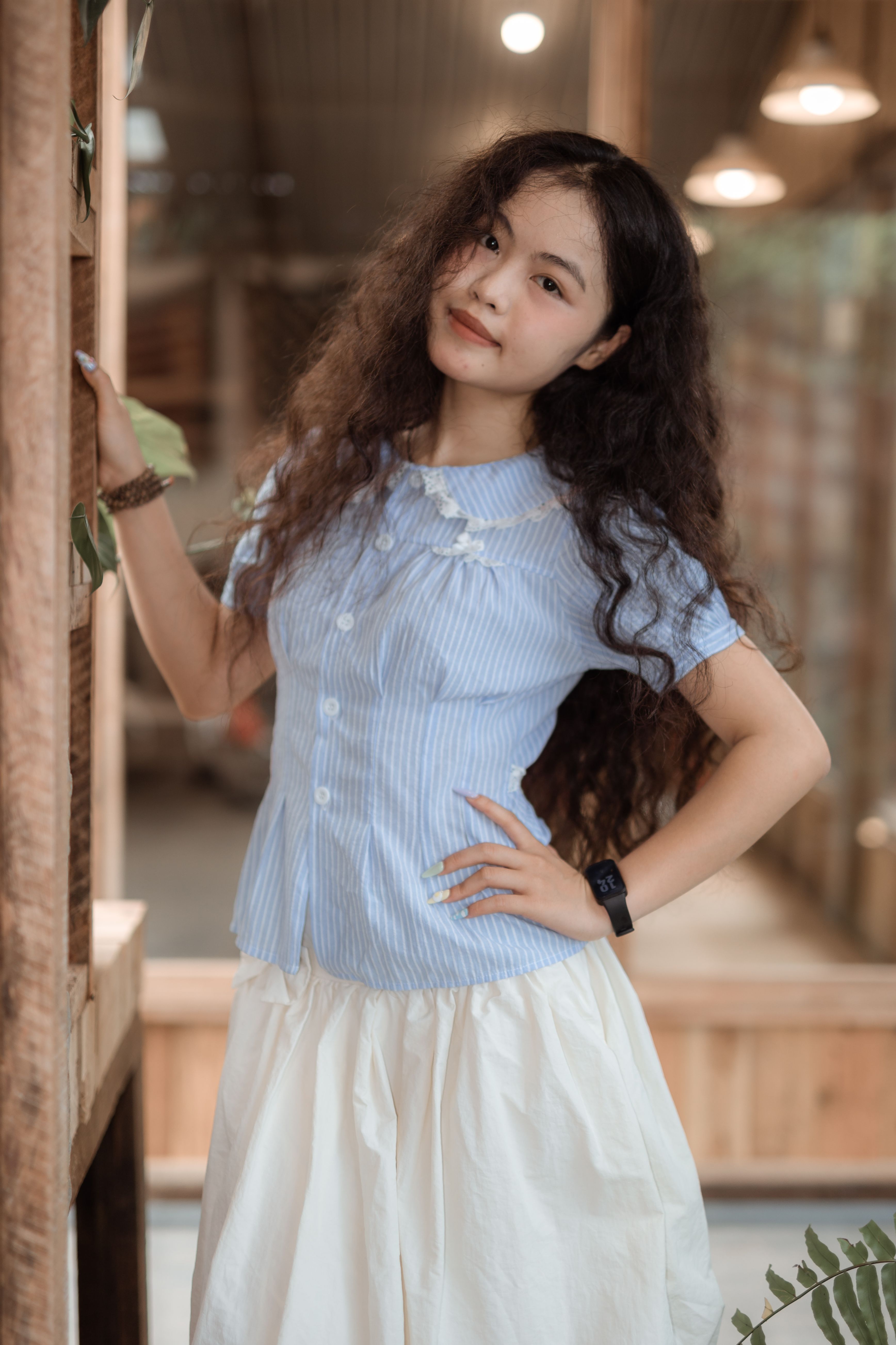 Portrait of a Young Woman in Casual Attire · Free Stock Photo