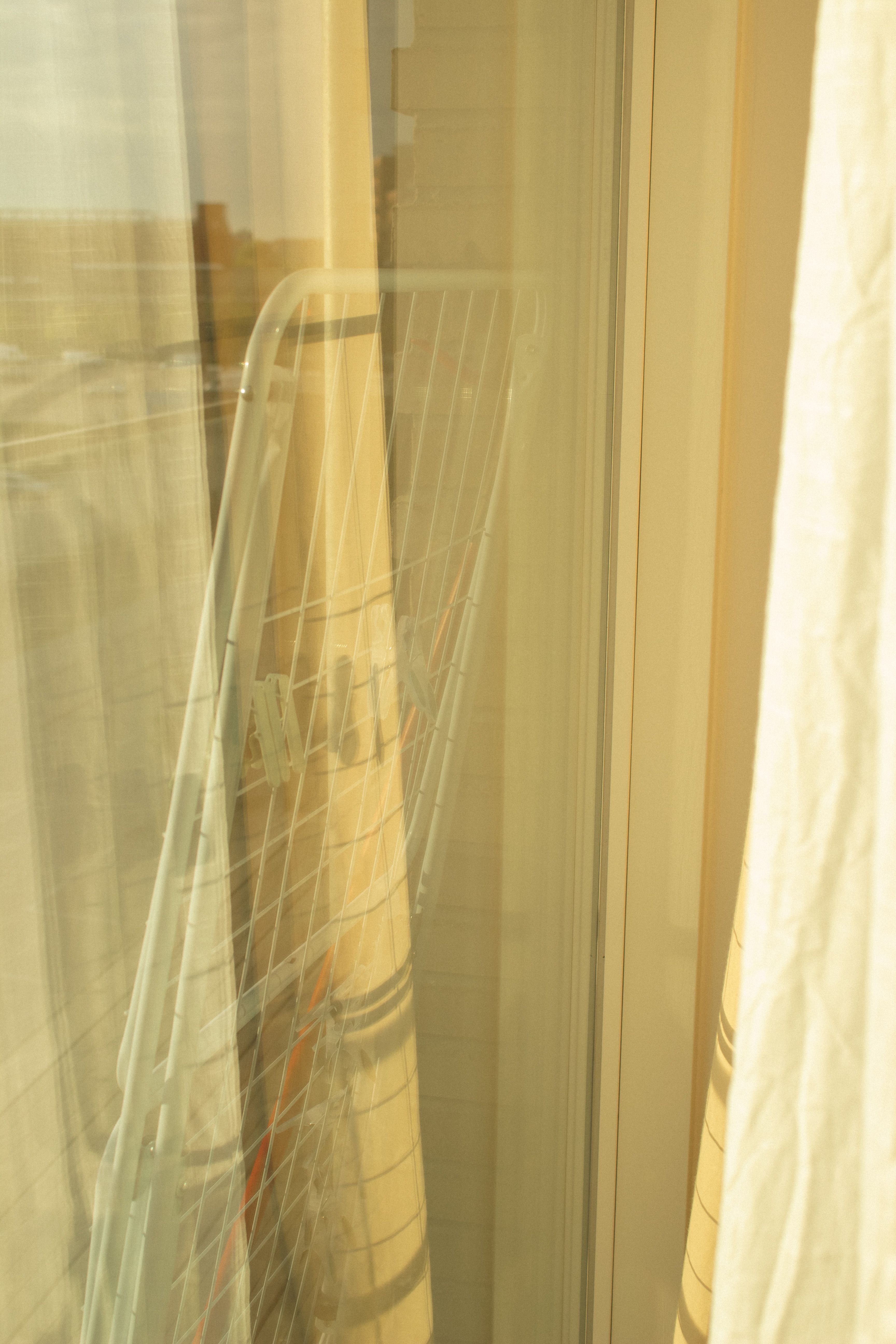 laundry drying rack indoors near window