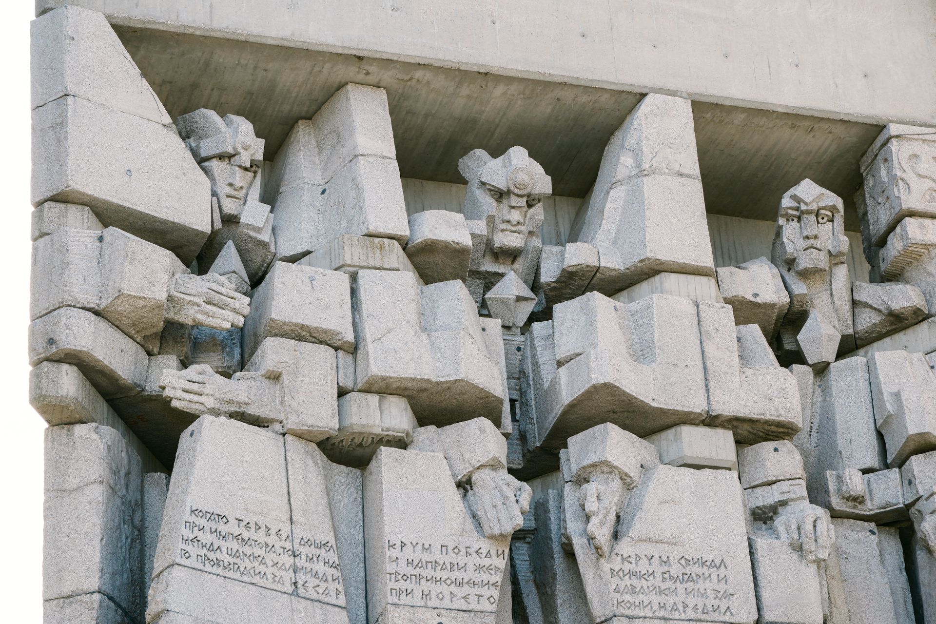 Close-up of a dramatic stone sculpture in Varna, showcasing artistic architecture and historical influence.