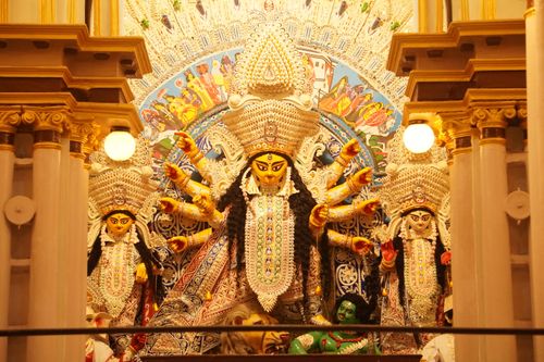 Free Exquisite Durga Puja decoration in Kolkata showcasing vibrant Hindu cultural artistry. Stock Photo