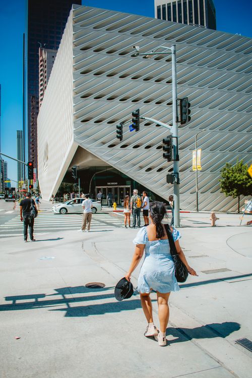 Free Street scene outside The Broad in Los Angeles, featuring modern architecture and urban lifestyle. Stock Photo
