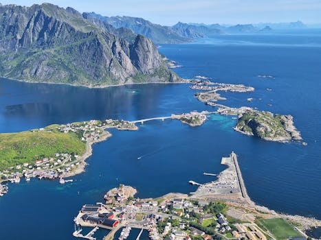 Stunning aerial shot of a coastal town and fjord in the Lofoten Islands, Norway.