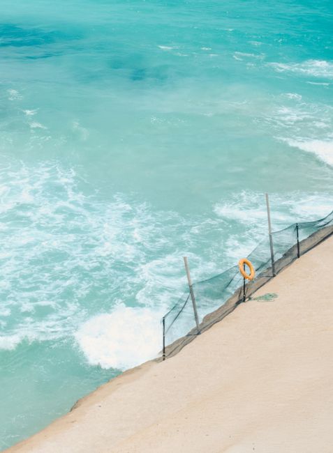 Stunning aerial shot of Marsa Matruh beach with turquoise waters and sandy shores.
