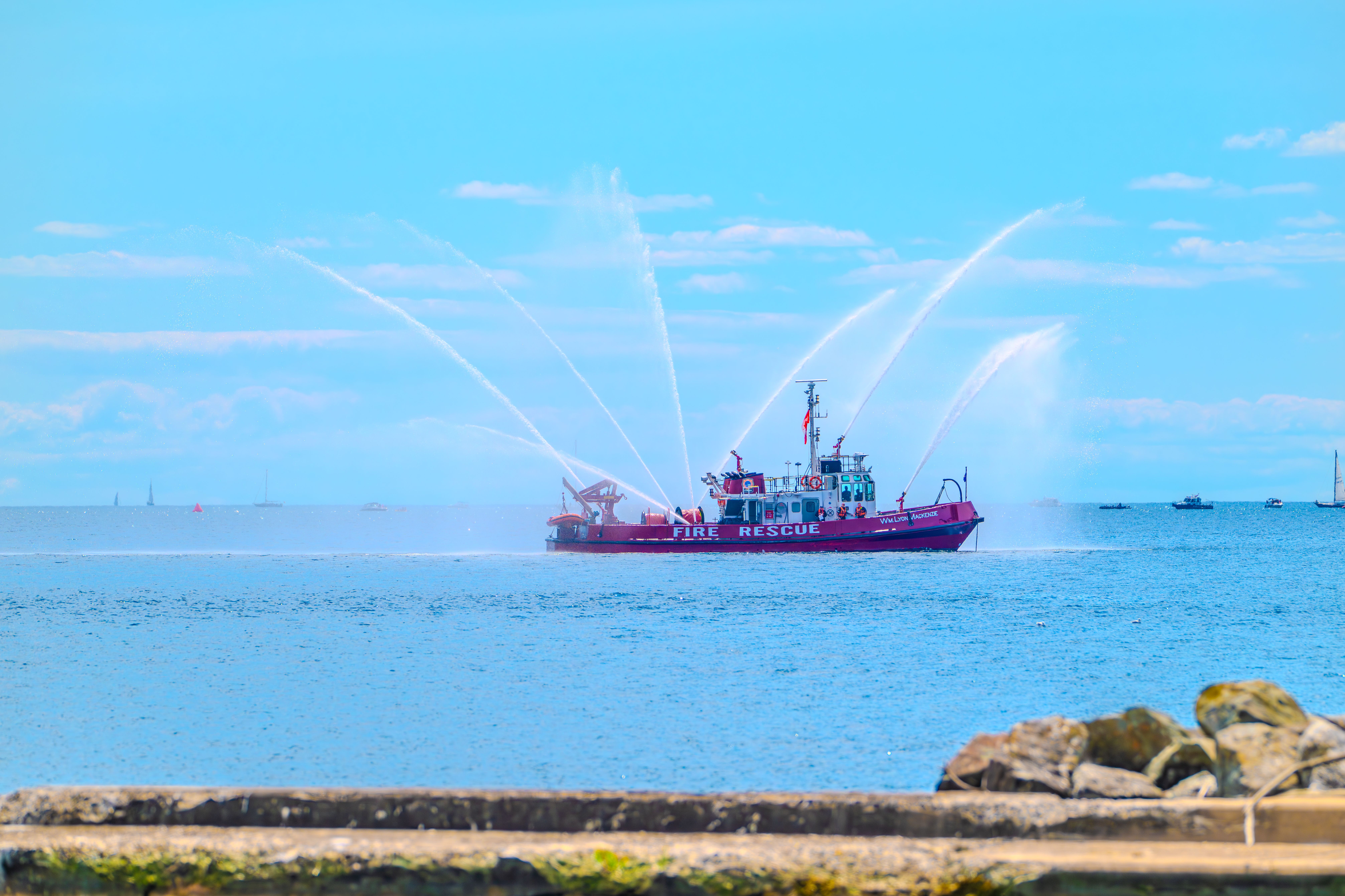 Fire Rescue Boat Spraying Water in Ocean · Free Stock Photo