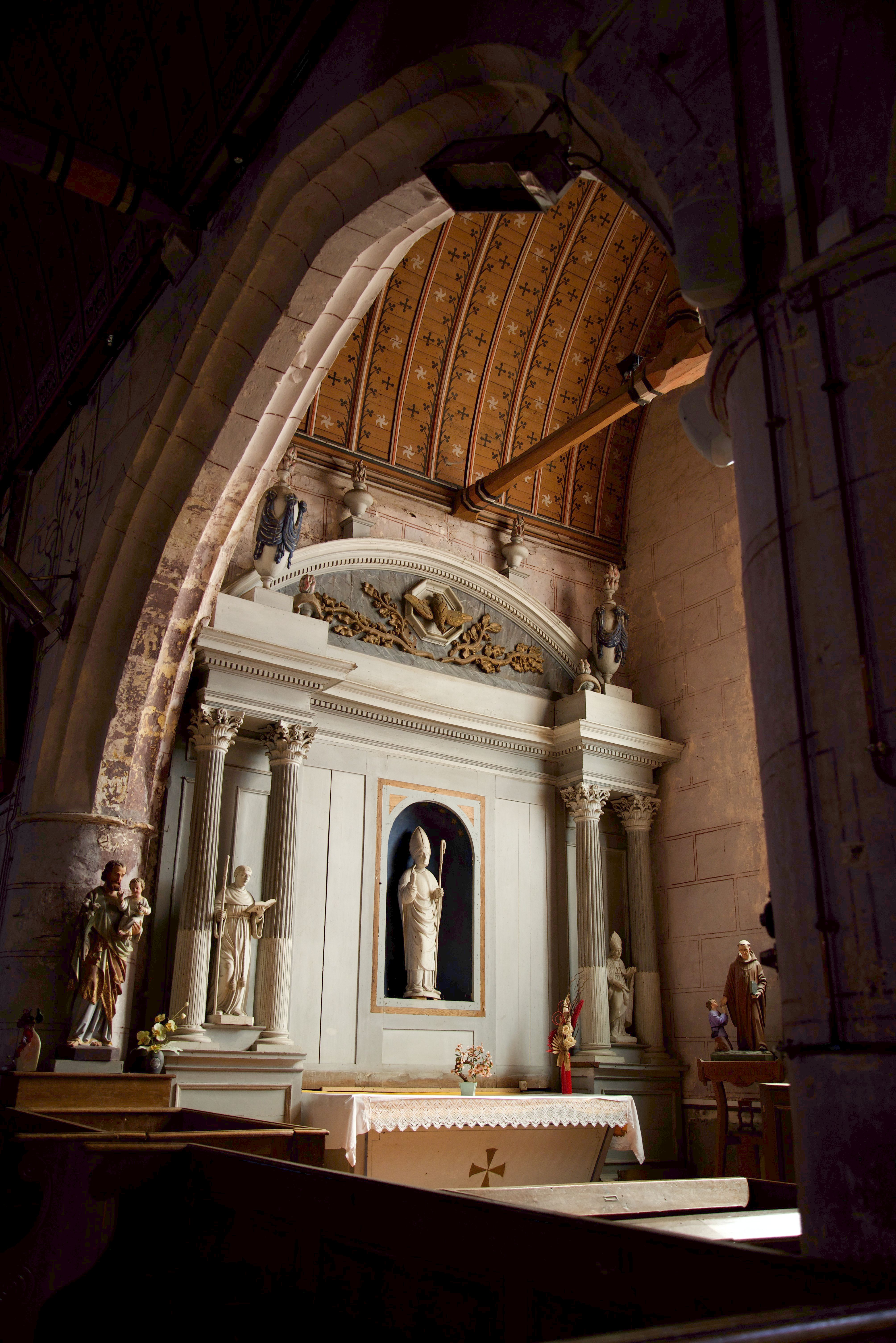 Gothic altar with statues and carvings in Vald’Yerre, France.