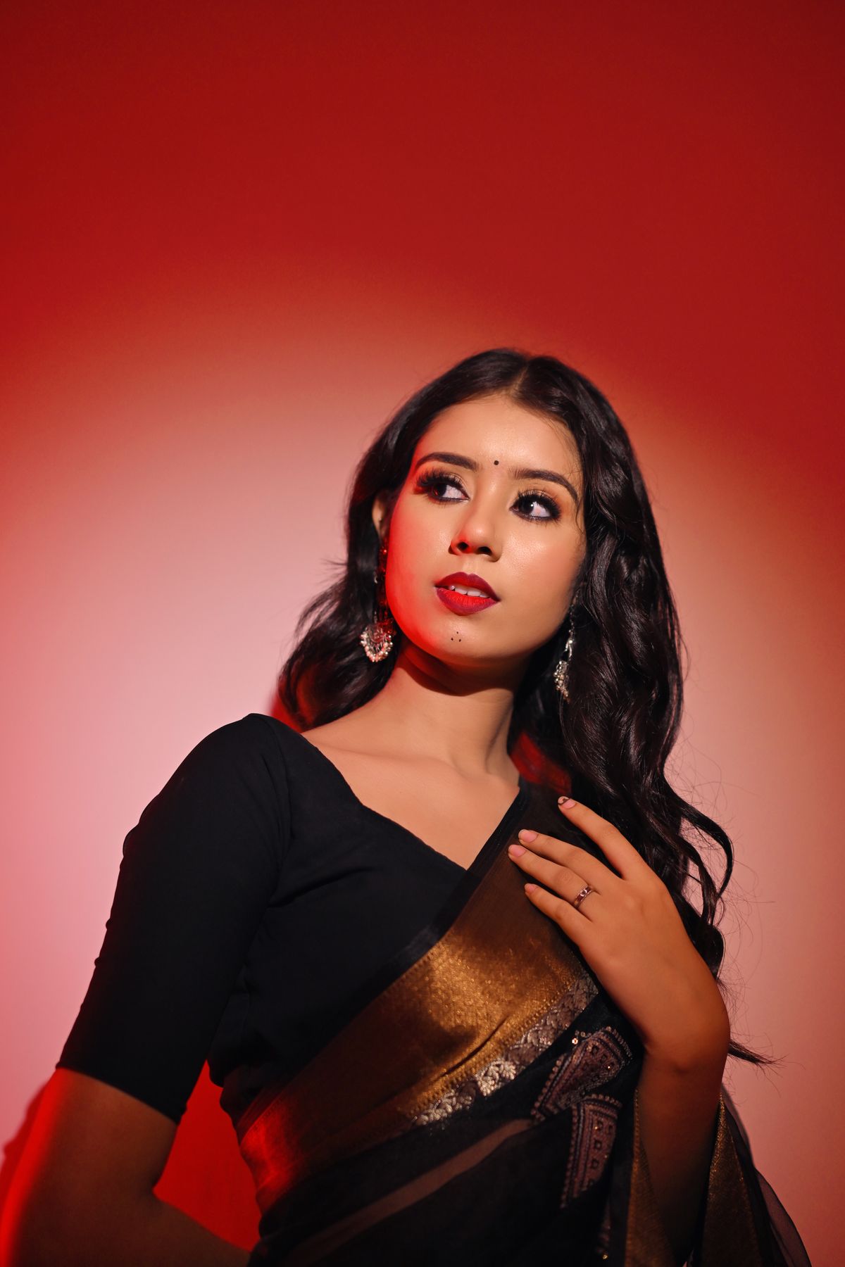 Elegant Indian woman showcasing professional saree draping and styling