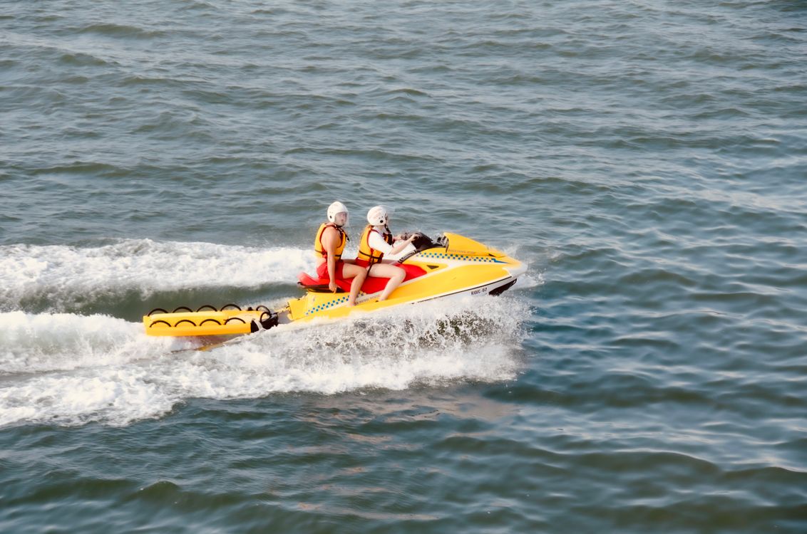 Exciting Banana Boat Ride on Open Water · Free Stock Photo