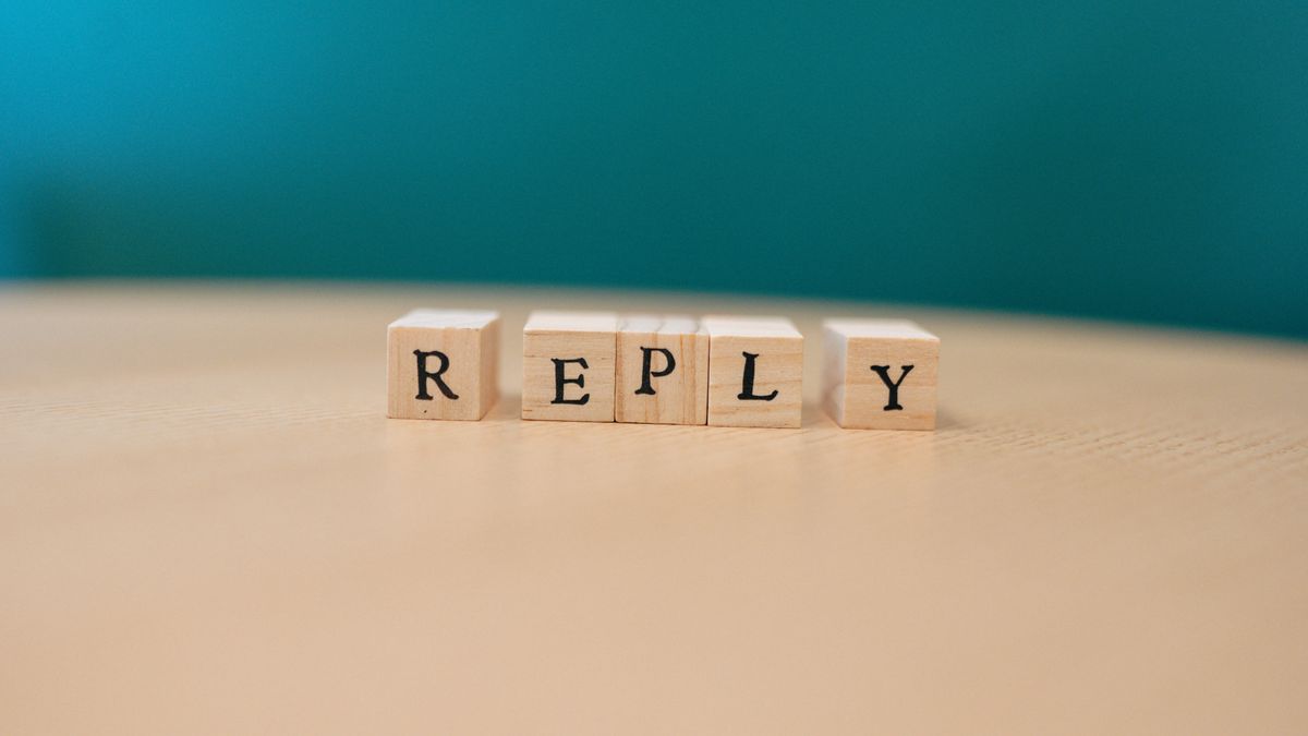 Letter tiles spelling REPLY