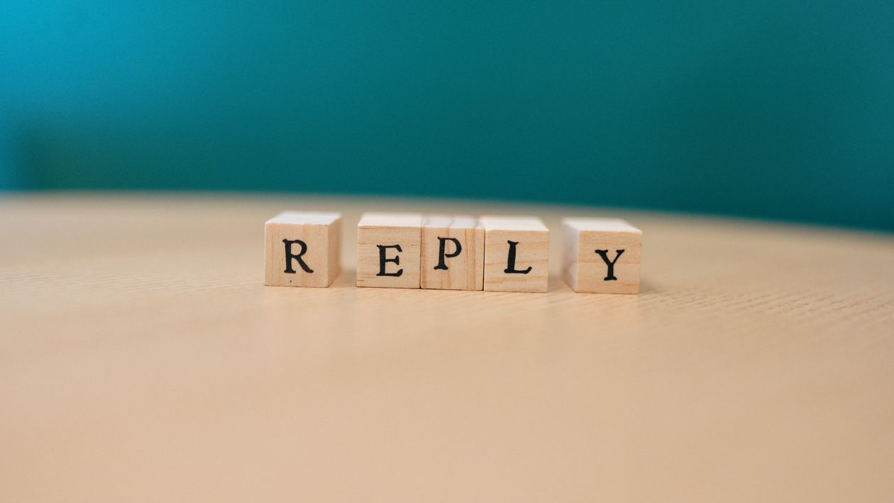 Relpy Wooden Blocks Spelling 'Reply' on Table · Free Stock Photo