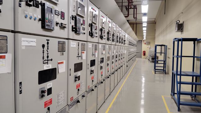 Industrial control room with LCD panels for building automation monitoring