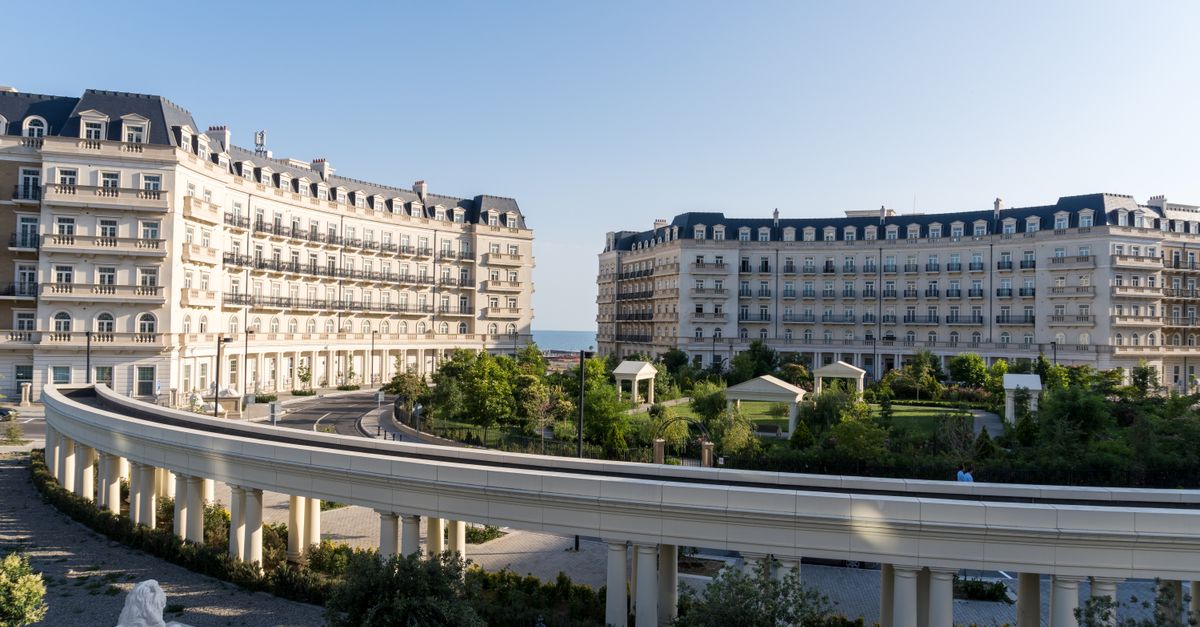 Baku's White City showcases elegant architecture with landscaped gardens and a modern urban feel.