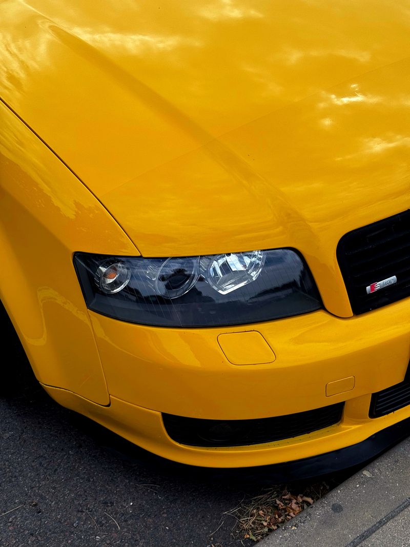 Close-up of a clean, sleek car headlight