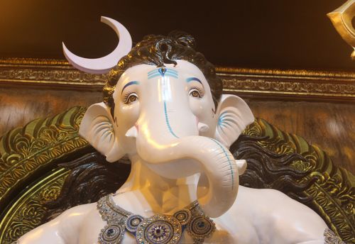Free Ornate depiction of Lord Ganesha in a Mumbai temple during the Ganesh Chaturthi festival. Stock Photo