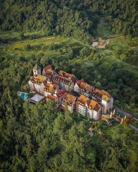 A stunning aerial view of Colmar Tropicale surrounded by lush greenery in Bentong, Malaysia.