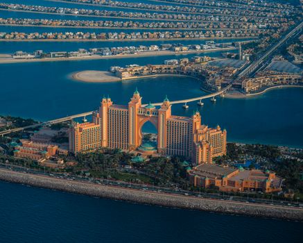 A breathtaking aerial view of Atlantis The Palm resort with surrounding water and palm-shaped islands in Dubai.
