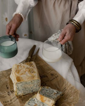 A cozy homemade breakfast setup with fresh pastry and milk, styled in a rustic aesthetic