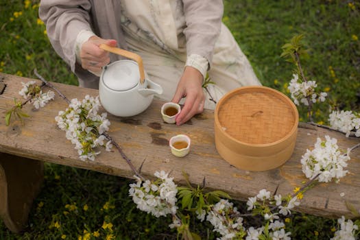 Enjoy a serene tea ceremony surrounded by blooming cherry blossoms in spring.
