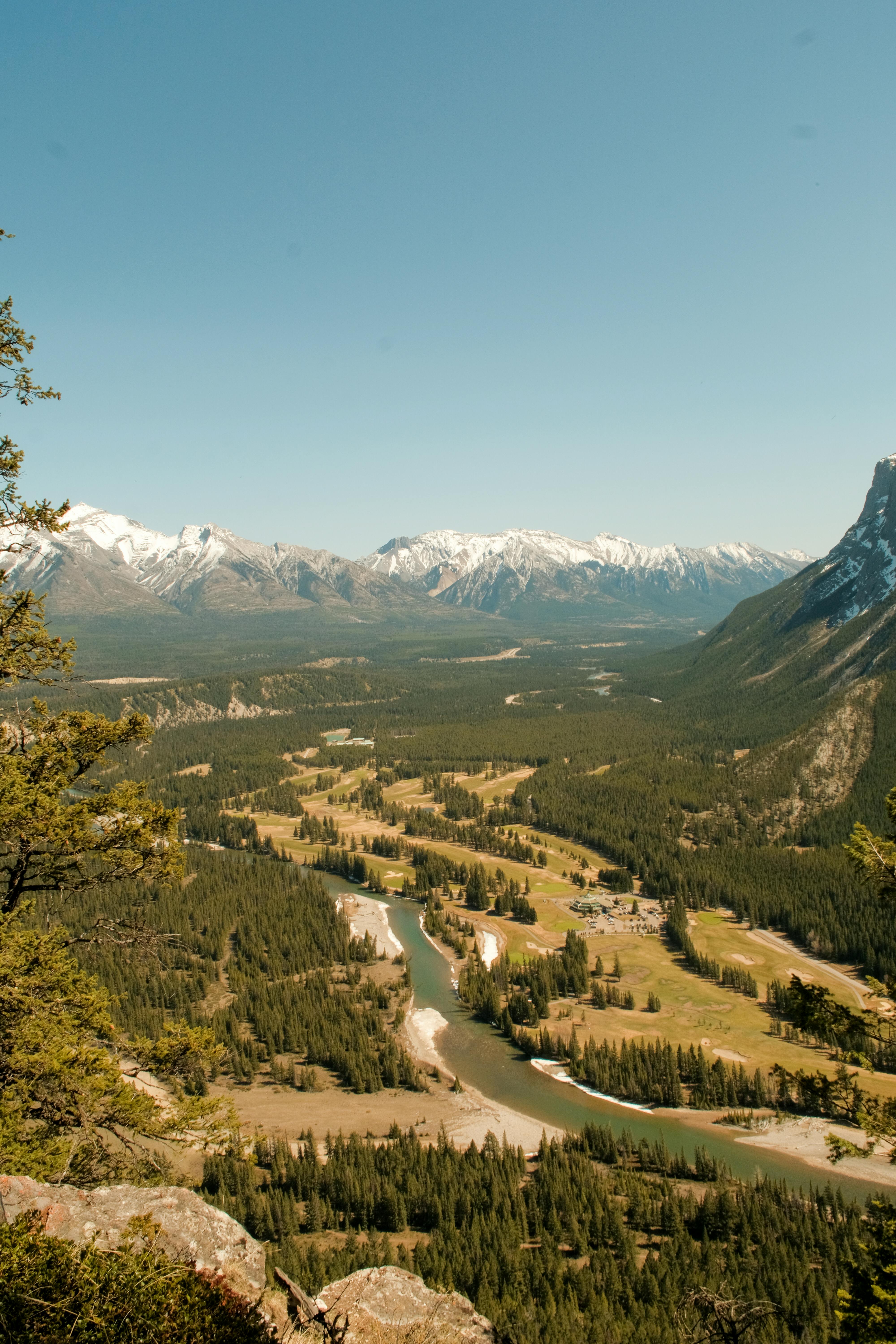 Breathtaking panoramic view of Bow Valley with mountains and river in Banff National Park, Alberta, Canada.