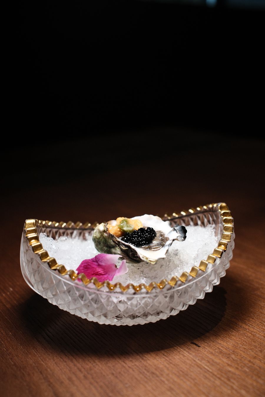 Exquisite oysters with caviar in crystal dish