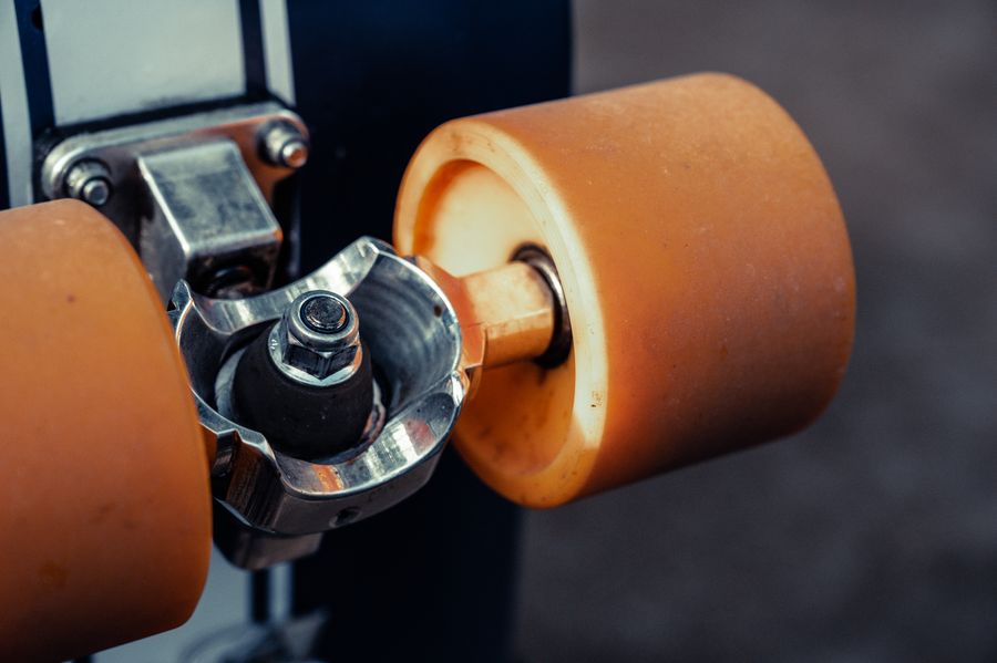 Close-up of a skate wheel and truck