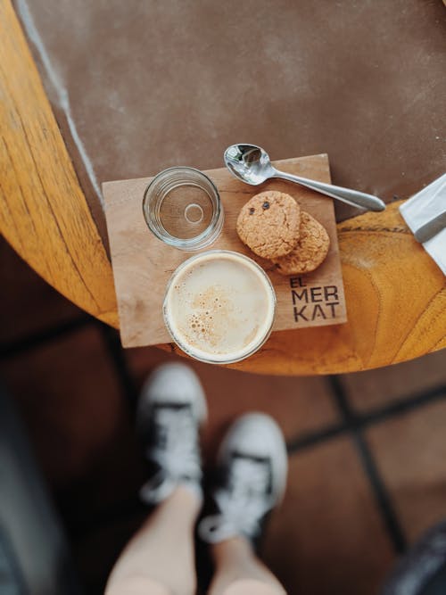 Free Cup of Beverage Beside Cookie Stock Photo