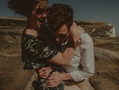 Selective Focus Photography of Woman Hugging Man