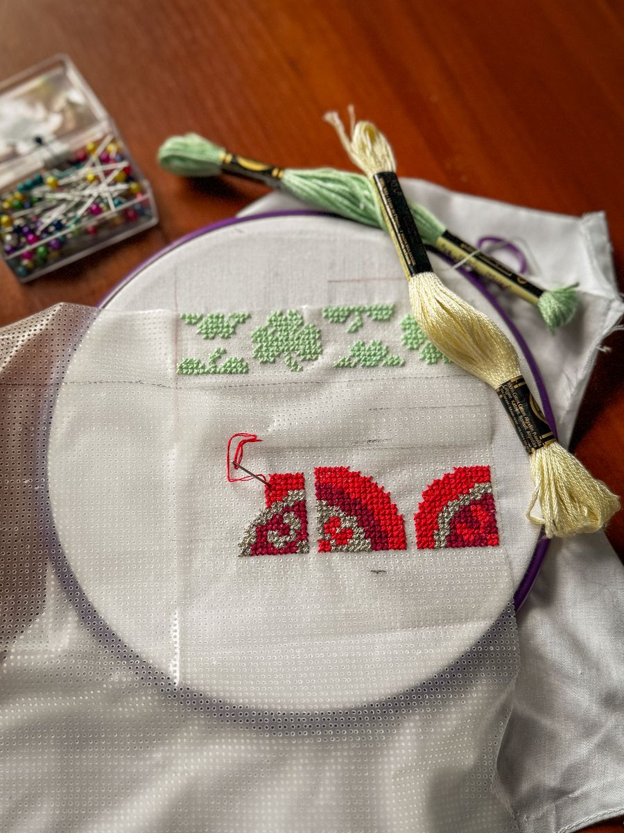 Cross-stitch border with floss