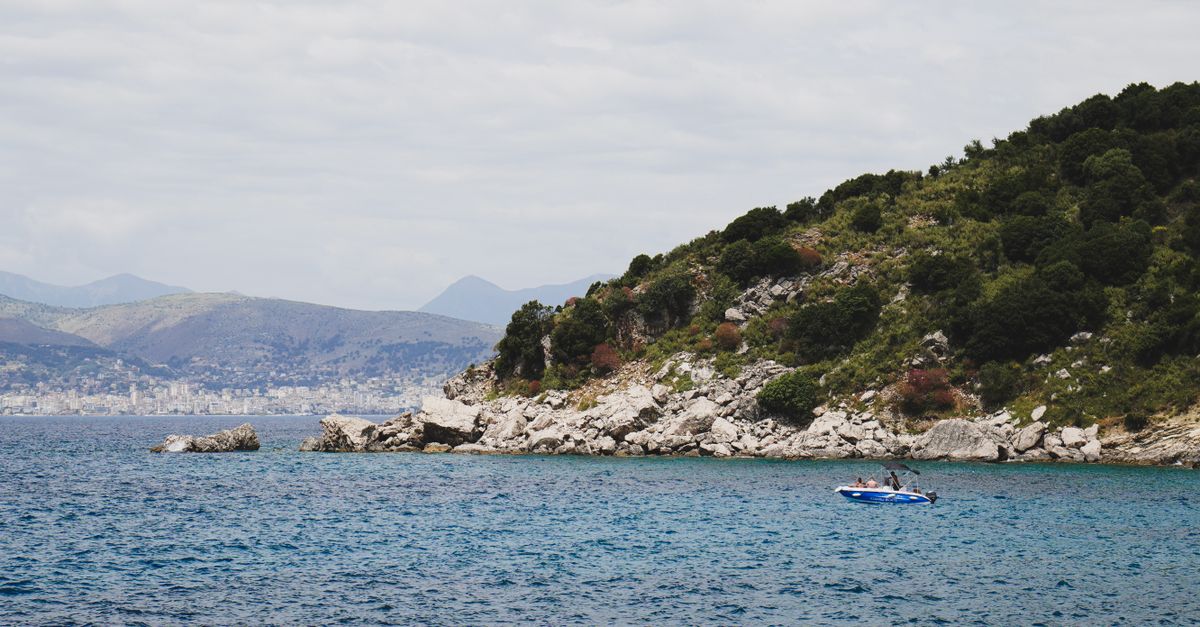 Albanian Riviera turquoise beach with mountains