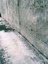 Gray Concrete Wall With White Snow