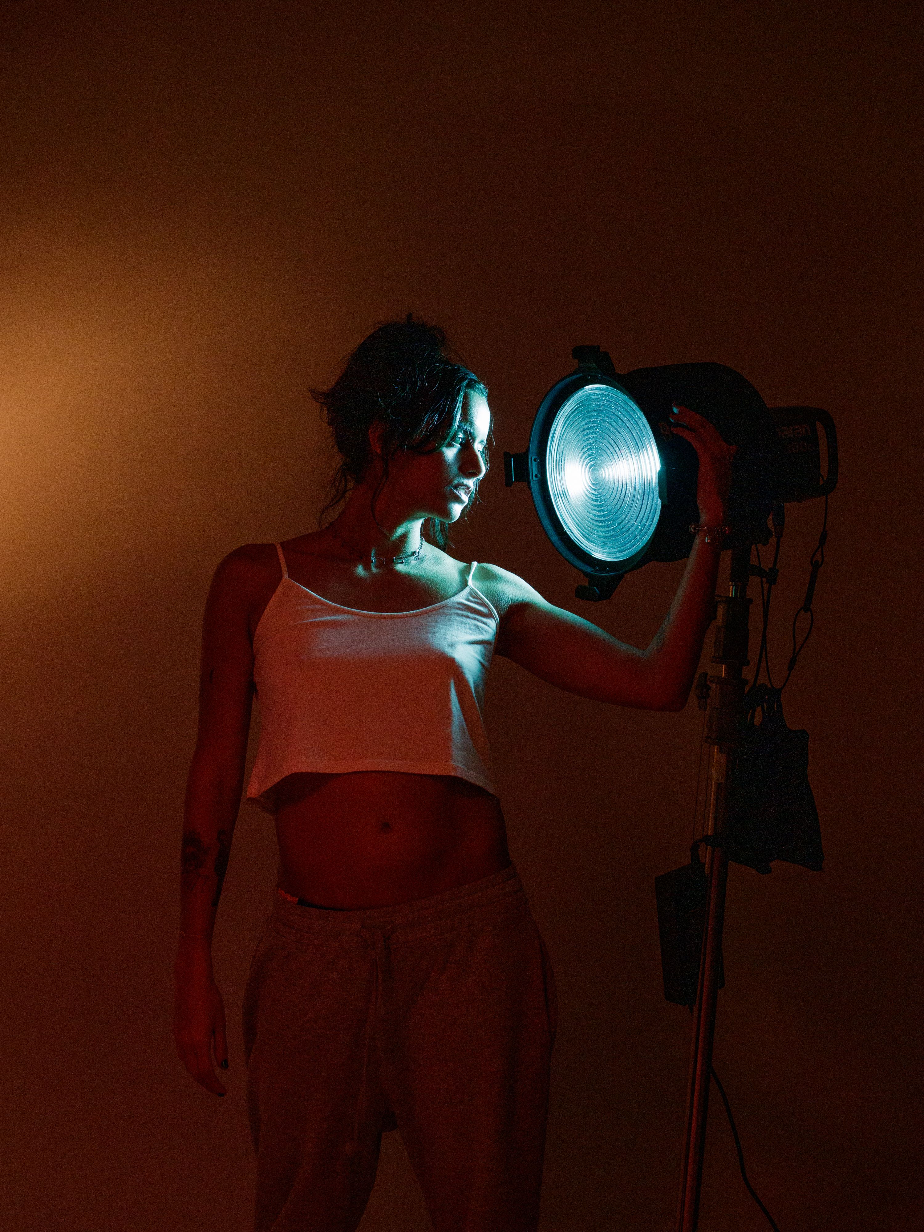 Creative Studio Portrait with Dramatic Lighting · Free Stock Photo