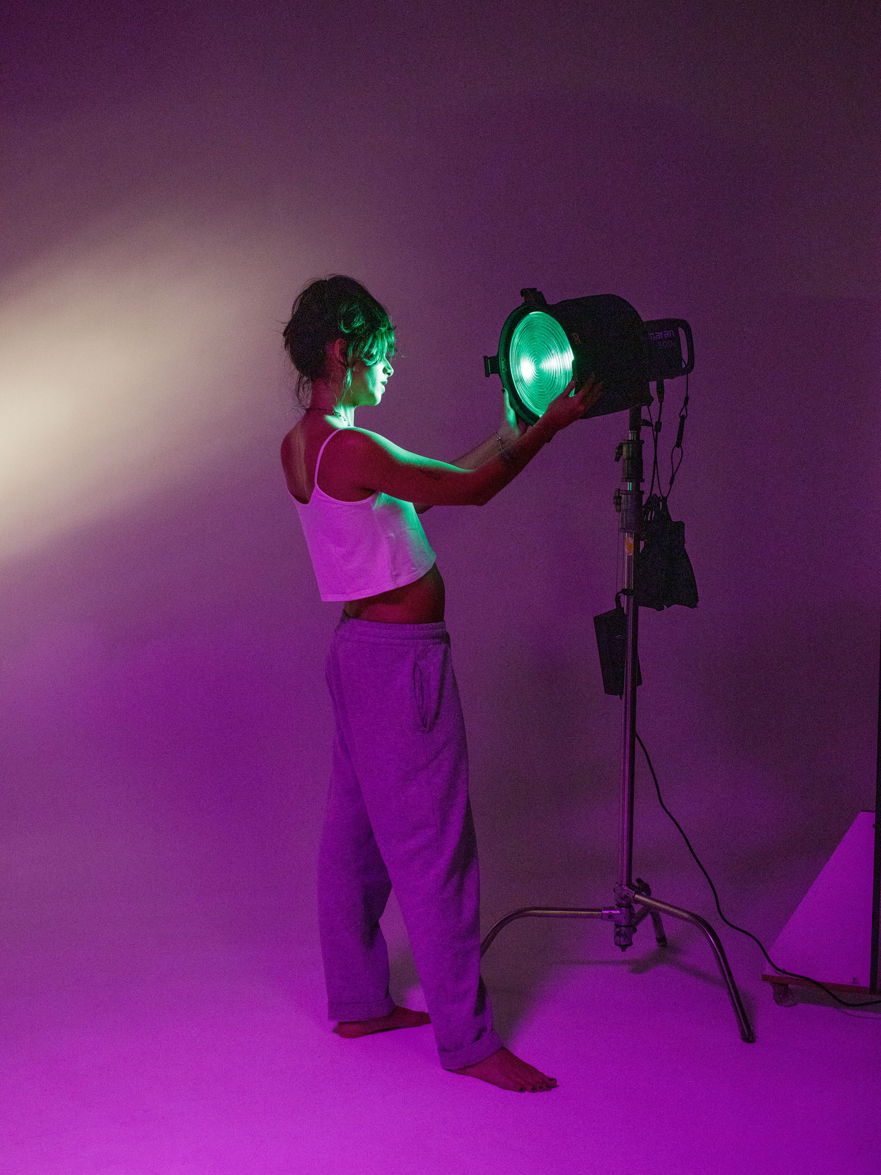 Creative Studio Portrait with Dramatic Lighting · Free Stock Photo