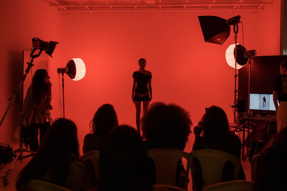 Fashion portrait in dramatic red lighting