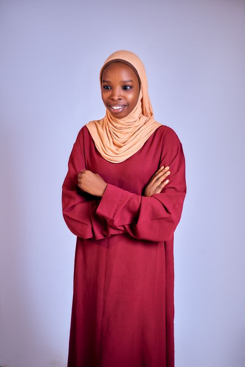 Portrait of Smiling Woman in Red Dress with Hijab · Free Stock Photo